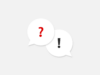 Zwei Sprechblasen mit Fragezeichen und Ausrufezeichen vor grauem Hintergrund